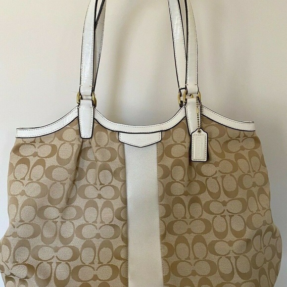 Coach Handbags - Brand New COACH Devine, new with tags.